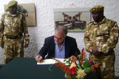 Luis Moreno Ocampo Signs Visitors book at Kenya Wildlife Service